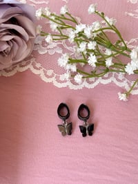 Image 1 of All Black Butterflies 