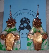 cowtag with cutesy cow and flower 