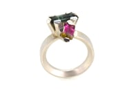 Image 1 of A contemporary ring featuring green and watermelon Tourmalines in a silver claw settings