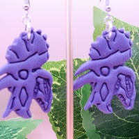 Image 1 of Triceratop Skull Wisteria