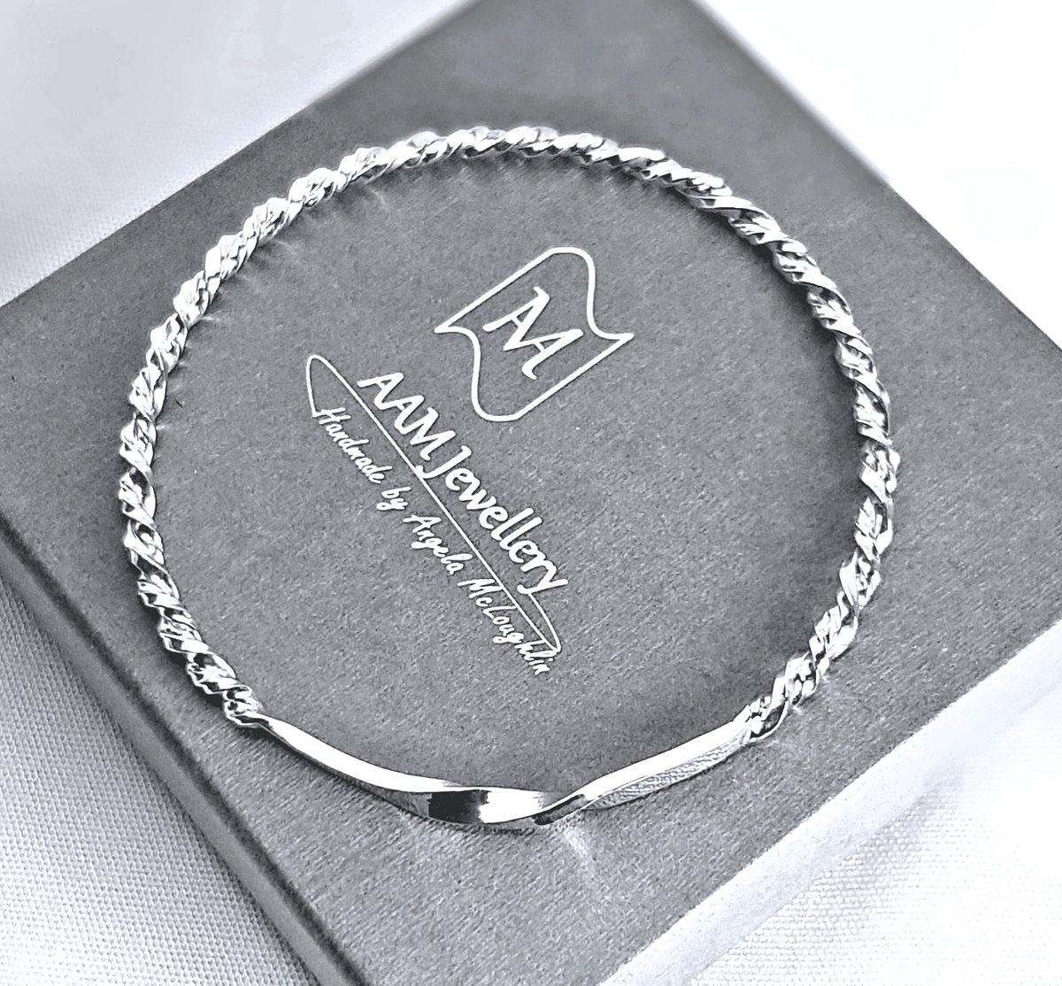 Image of Chunky Sterling Silver Bangle, Silver Twist Bangle, Recycled Silver, Sustainable Jewellery UK