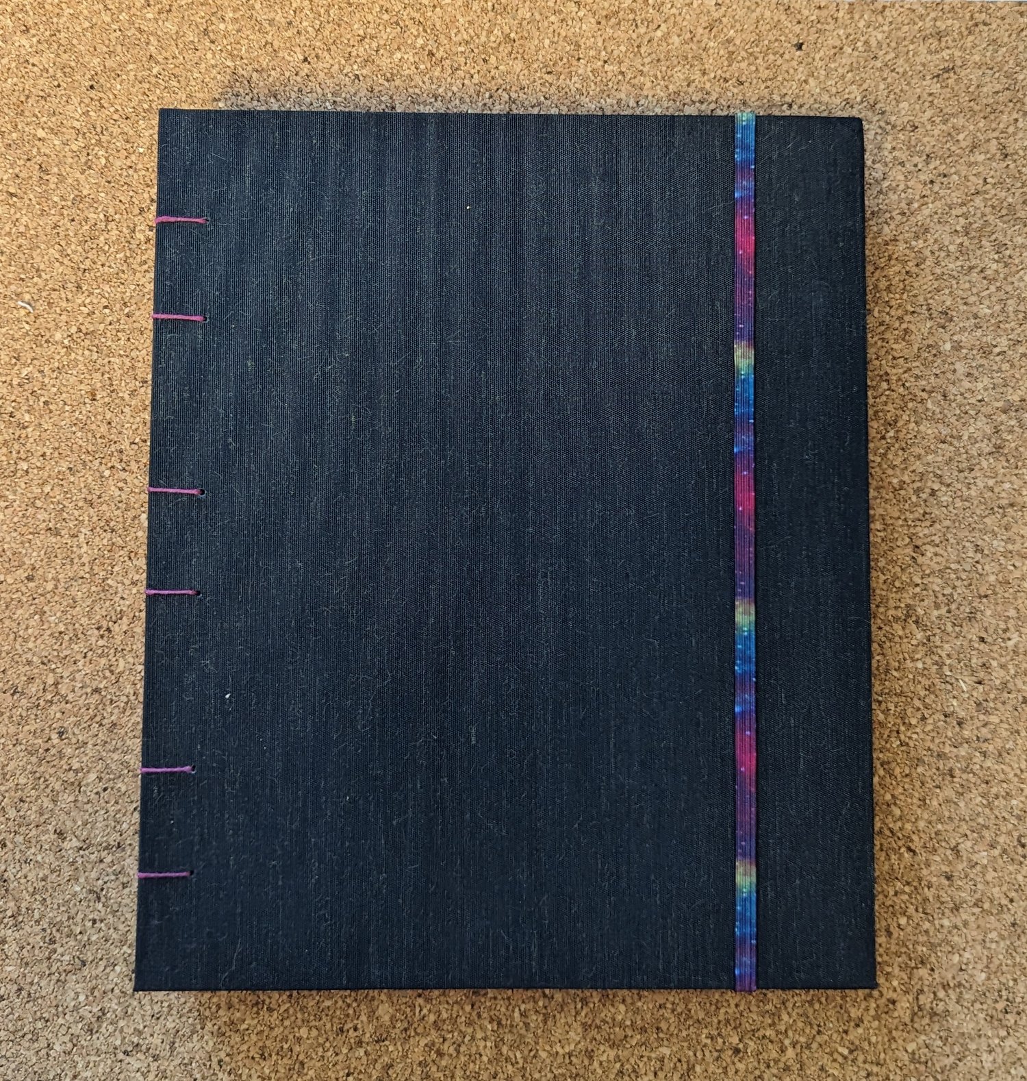 Image of Large Black Silk Lined Journal with Rainbow Nebula Elastic