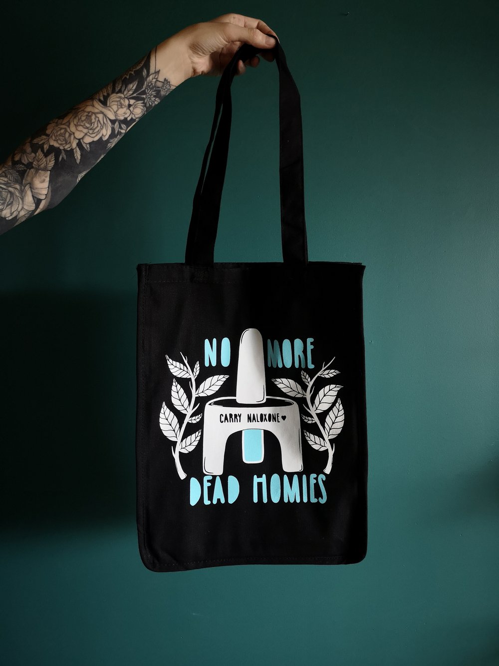 'no more dead homies, carry naloxone' large tote bag 