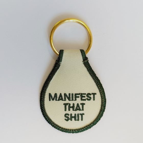 Image of Manifest That Shit Fabric Keytag