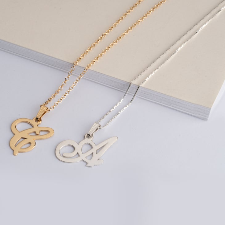Image of Gold Cursive Letter Necklace