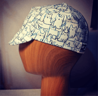 Cotton cycling cap - cats dark blue on white