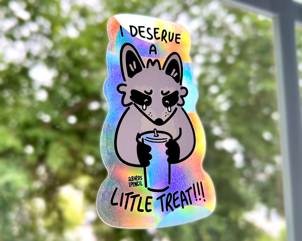 Image of Treat yourself raccoon suncatcher sticker