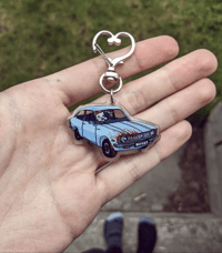 Image 3 of hit and run kitty keychain