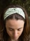 Image of MOSS in green twist headband