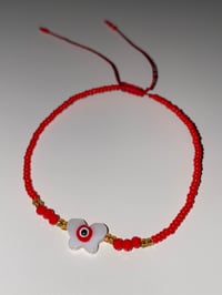 Image 2 of Red/white butterfly evil eye bracelet 