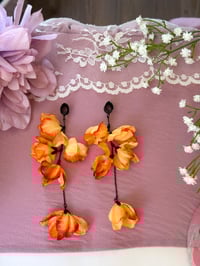 Image 2 of Oversized Orange Flower Dangles (BLACK)