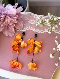 Image 1 of Oversized Orange Flower Dangles (BLACK)