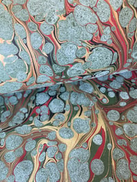 Image 1 of Marbled Paper #84 'Winter Forest' on green base paper