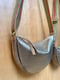 Image of Cormac metallic Half Moon bag