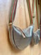Image of Cormac metallic Half Moon bag
