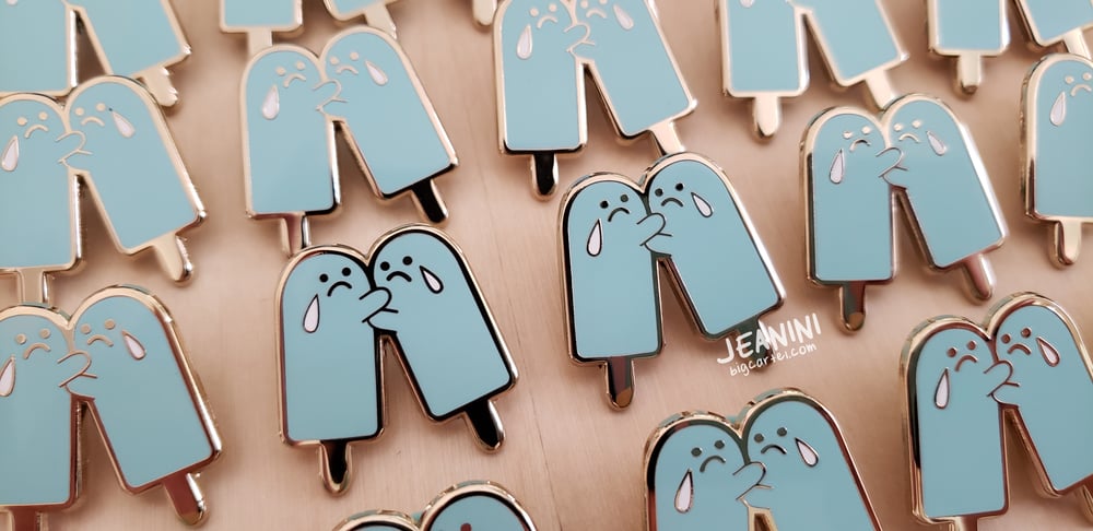 Image of sad blue pops ✨ enamel pin