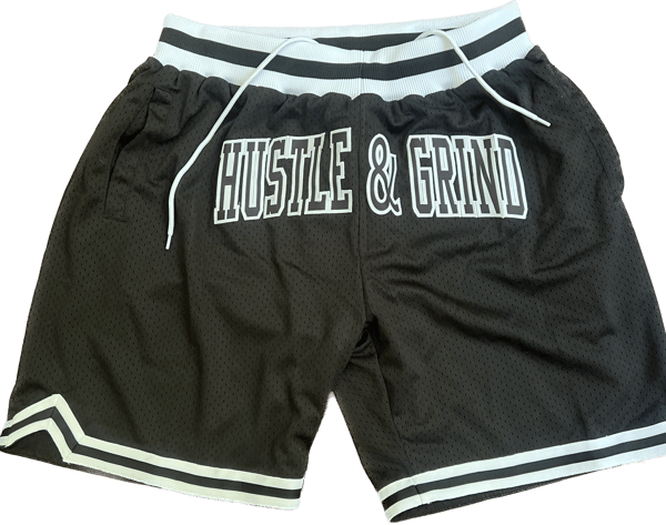 Image of Hustle & Grind Basketball Shorts Black w/White & Black letters. 