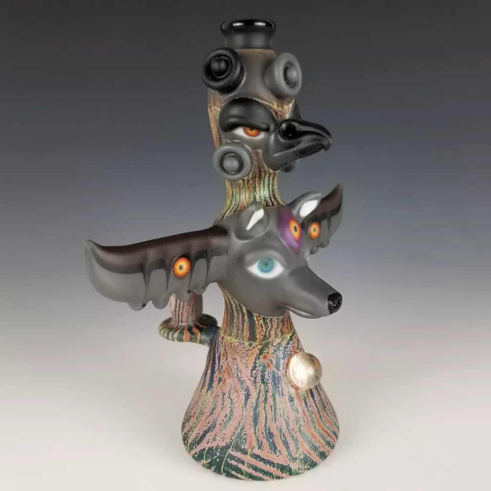 Image of Double Totem Pole with Bird and Wolf 