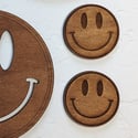 Smiley face coaster set