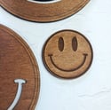 Smiley face coaster set