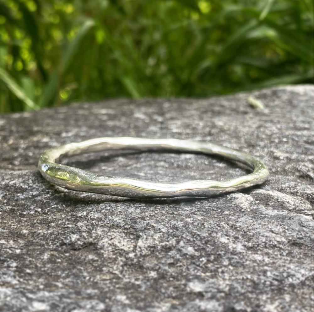 Image of Silver honey bangle