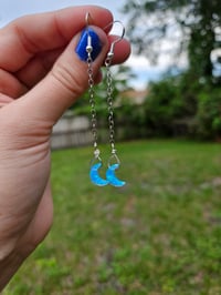 Image 3 of Blue opal crescent moon earrings. 