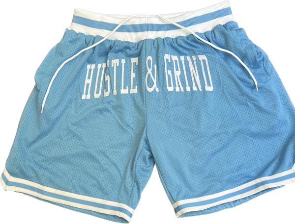 Image of Hustle & Grind Basketball Shorts Baby Blue w/White letters.