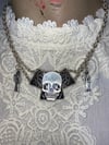 Upcycled Skull and Mini Santa Muerte Necklace by Ugly Shyla 