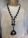 Upcycled Black Necklace With Skull and Mini Santa Muerte Charms by Ugly Shyla 