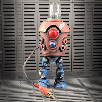 Image 1 of Clunker Figure - Red with Blue Legs