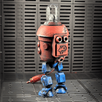 Image 2 of Clunker Figure - Red with Blue Legs