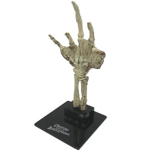 Image of Universal Monsters Creature from the Black Lagoon Fossilized Creature Hand Scaled Prop Replica