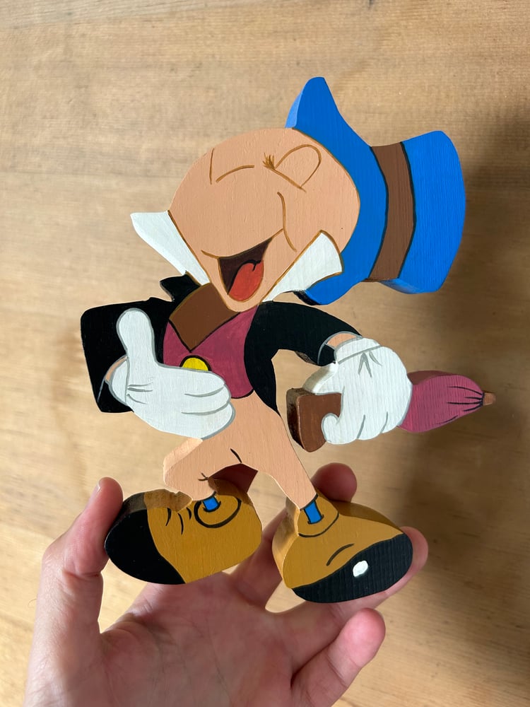 Image of Jiminy Cricket cut out.