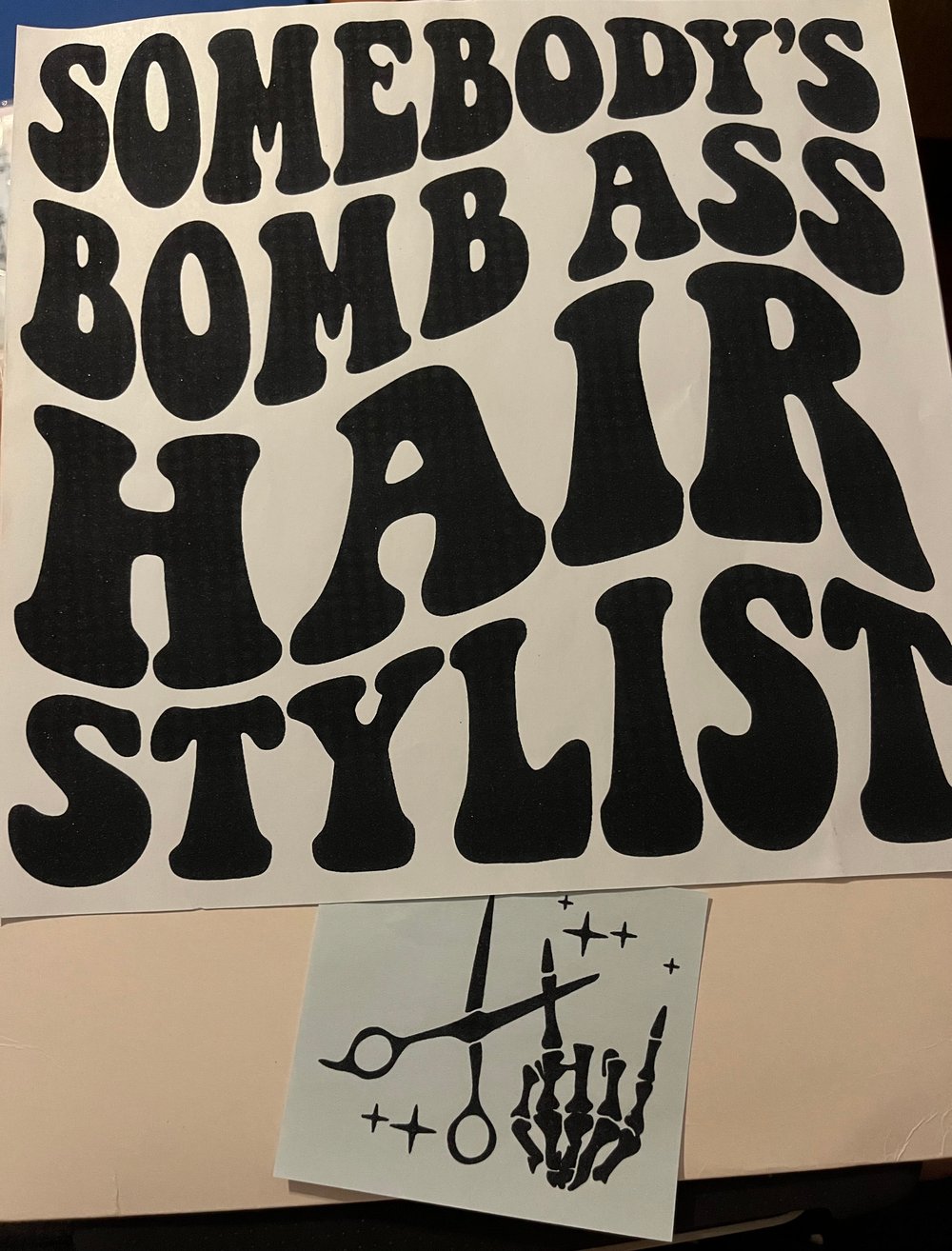 Image of Somebody's Bomb Hairstylist Design Front Pocket & Back 