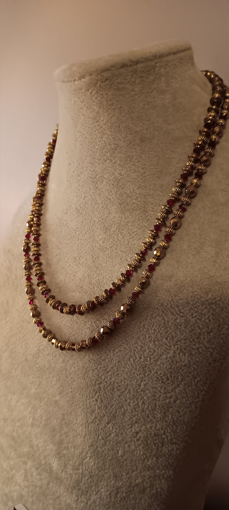 Image of GOLDEN HEMATITE SPACER BEADS WITH DEEP RED SWAROVSKI BICONE BEADS