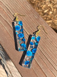 Image 2 of Handmade Dangle Earrings with Real Flowers. Blue.