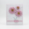 Whimsical Pink Daisy Bouquet: Handmade Blank Greeting Card with Embossed White Elegance
