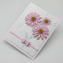 Whimsical Pink Daisy Bouquet: Handmade Blank Greeting Card with Embossed White Elegance