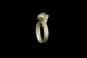 Contemporary gold ring set with salt and pepper diamonds