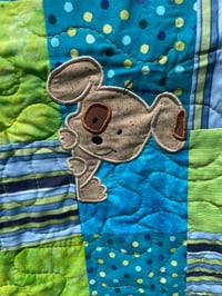 Image 2 of Appliqued Playful Pups Baby Quilt