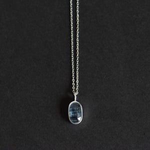 Image of Aqua Blue Kyanite crystal form oval shape mixed cut silver necklace no.2
