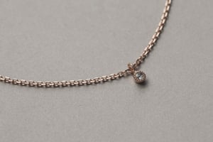 Image of 18ct Rose gold 2.0mm rose-cut white diamond necklace with a milled edge setting