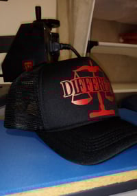 Image 1 of Red/Black "DIFFERENT" Trucker Hat