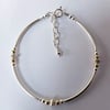Silver and 9ct gold bangle bracelet