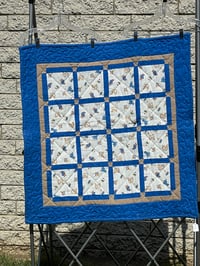 Image 1 of Dinosaurs and Monkeys in Blue Quilted Baby Blanket