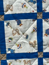 Image 2 of Dinosaurs and Monkeys in Blue Quilted Baby Blanket