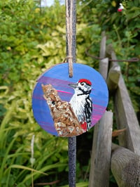 Image 1 of Woodpecker wood slice