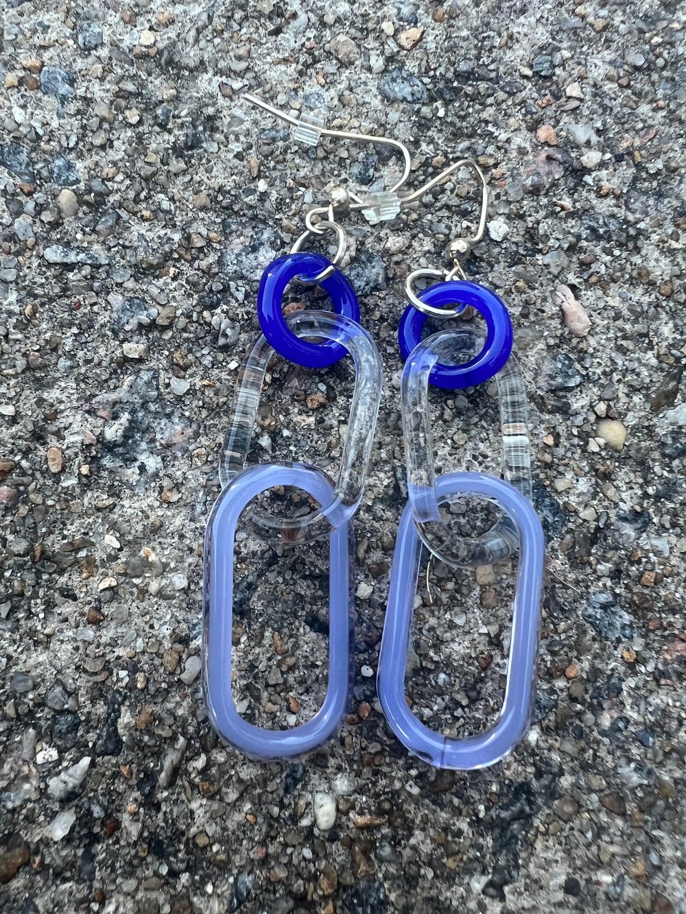 Image of Peacock clear and grape ice over powder blue earrings (o00)