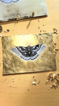 Image 1 of 'Gilded Moth' Hand-Leafed Prints
