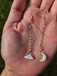 Image 2 of Drop down cloud and moon earrings. 